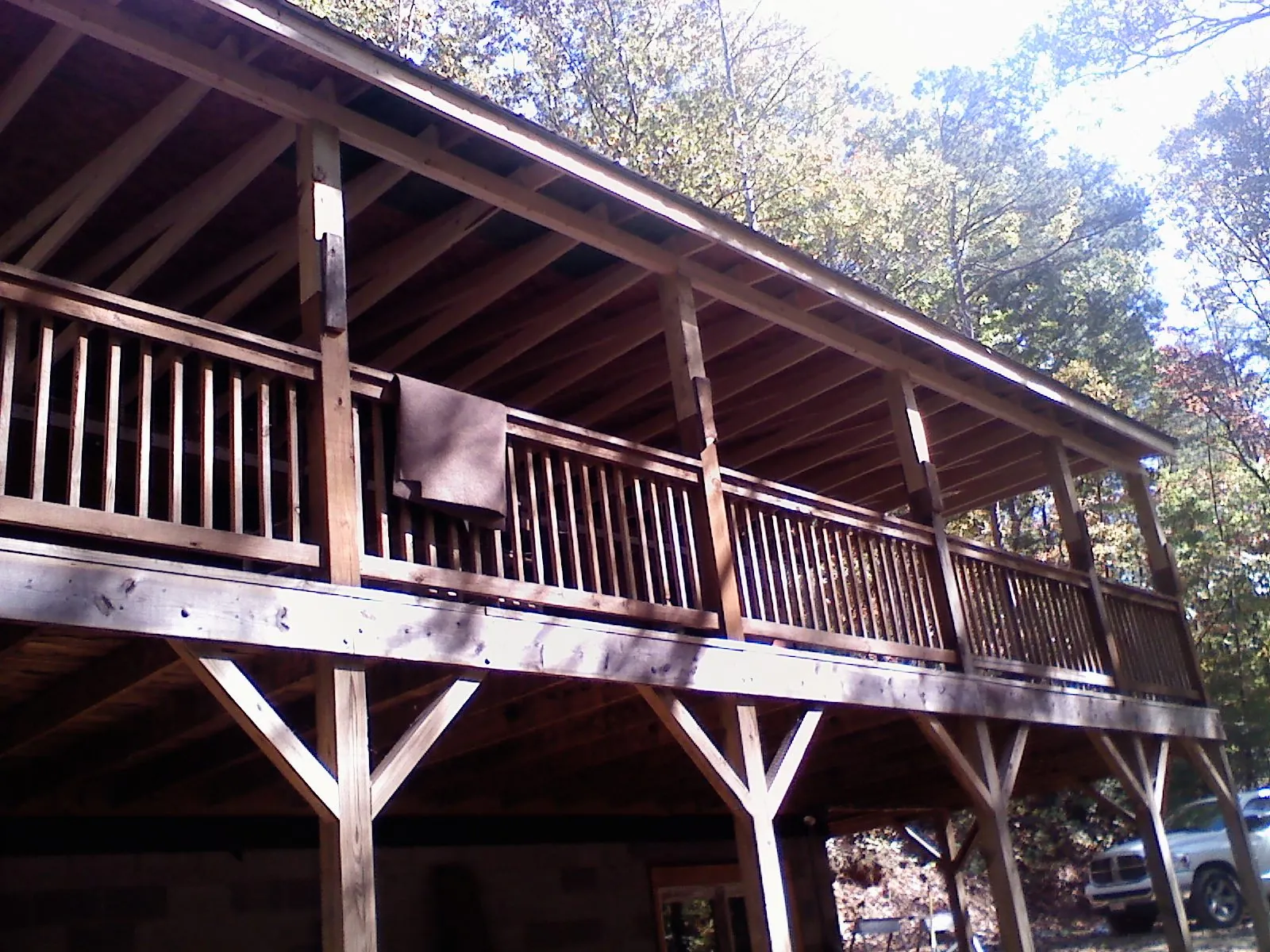 Timber framing under a new elevated porch and deck — Roof Leak Repair in Blue Grass by Roofing Brothers